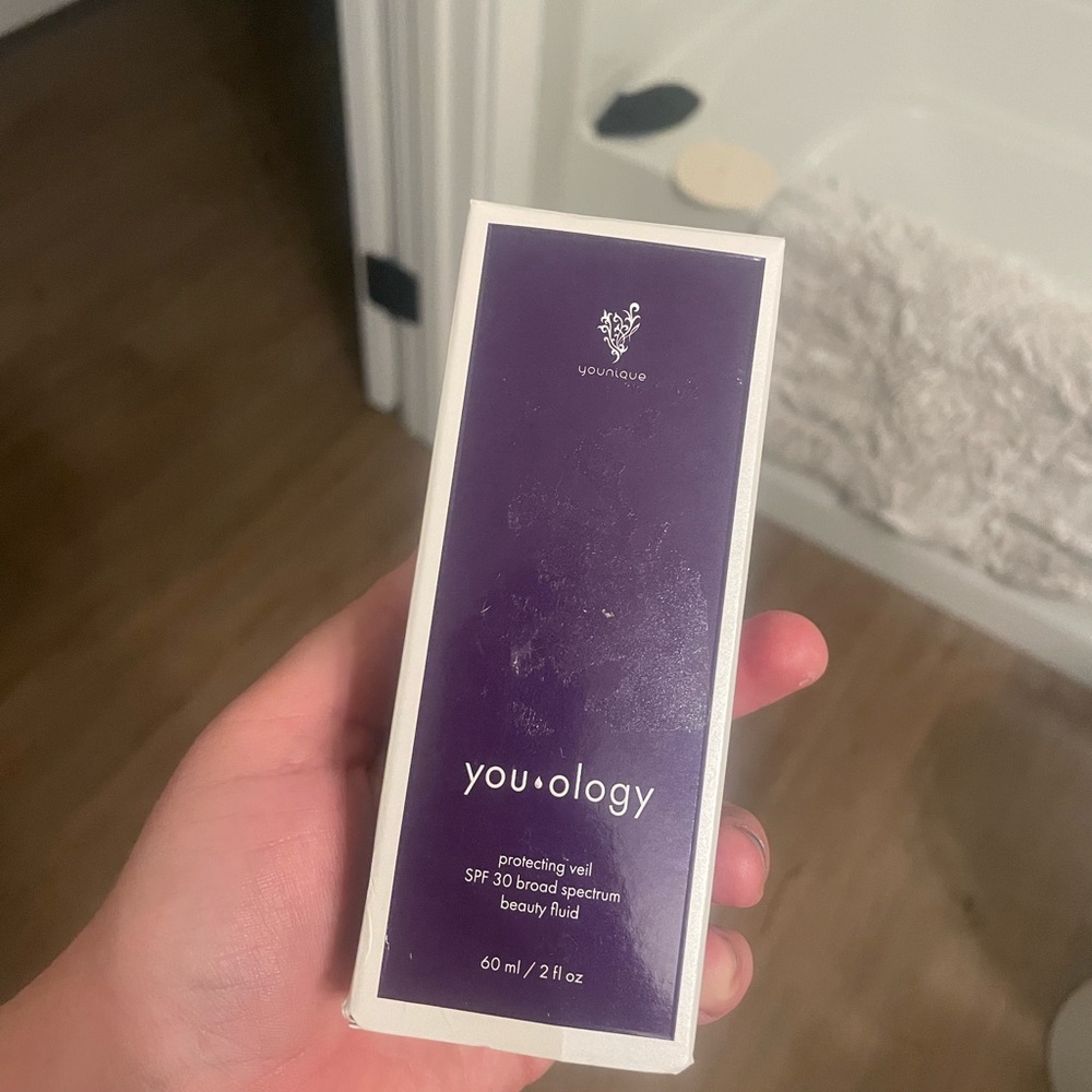 Younique Protecting Veil SPF 30 in Purple and White